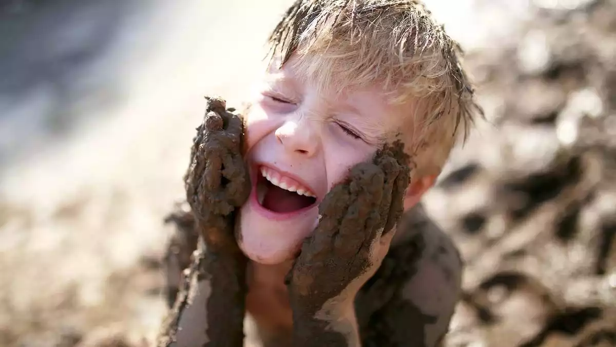 Boy with mud