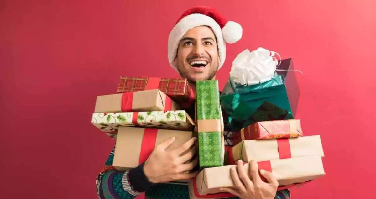 A man with Christmas gifts