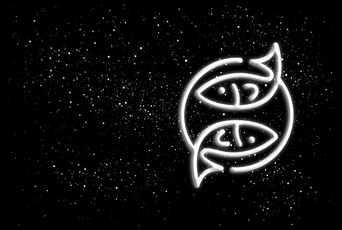 The Pisces sign in white on a black starred background