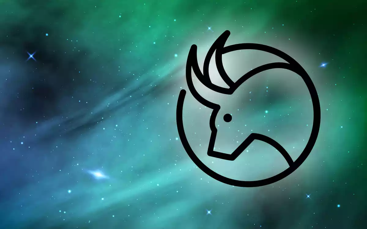 The Taurus sign in black on a sky background