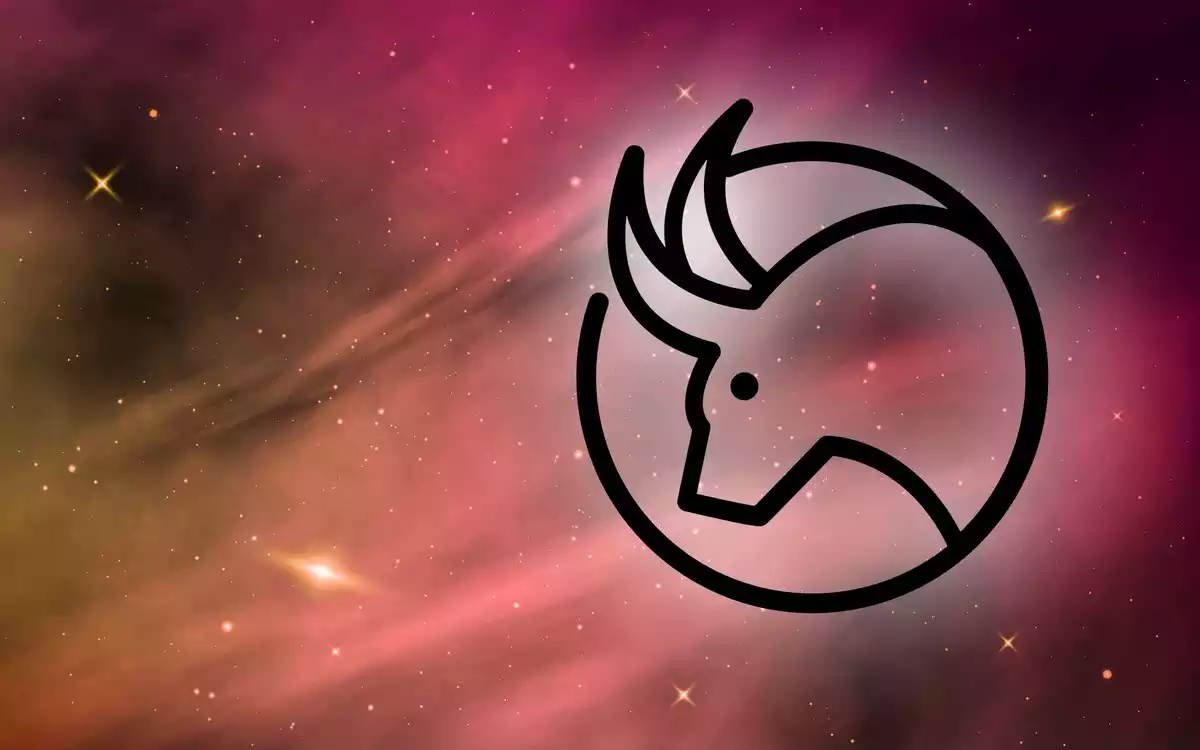 Taurus sign on a pink and orange sky with some stars behind it