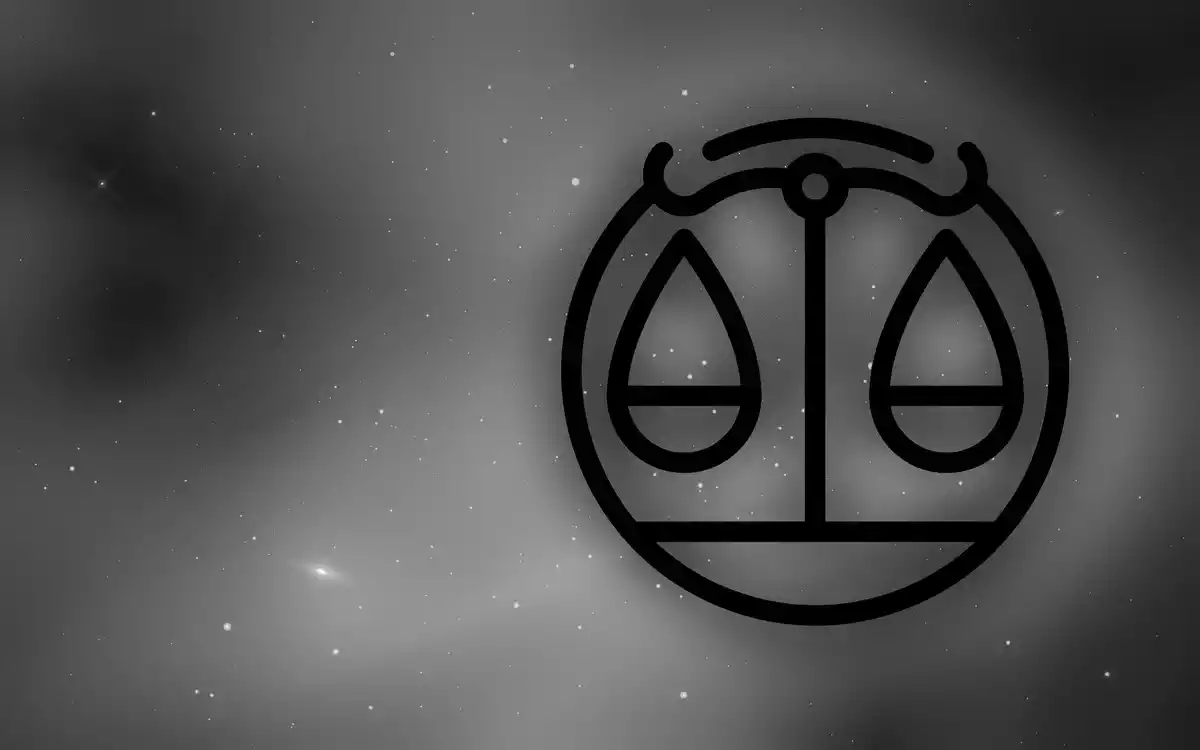 The Libra Sign on the right of the image in black and white